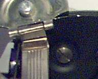 Fig 6, screw underneath film speed reminder dial